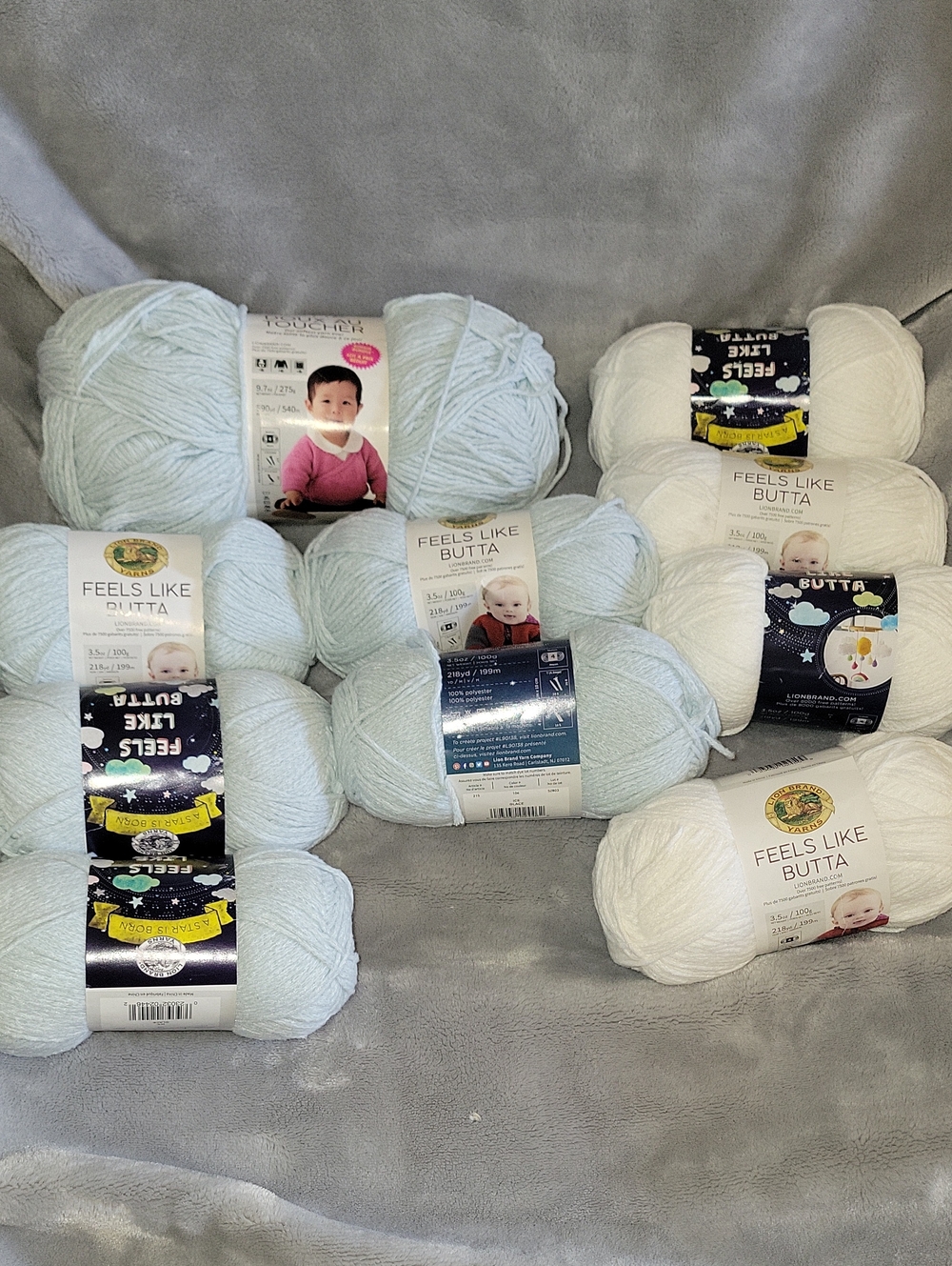 Feels Like Butta Yarn -  White and Ice Blue Lions Brand